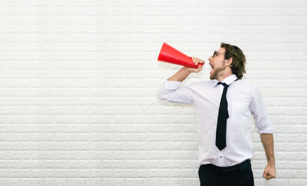 businessman shouting megaphone said something 29393 69 - Criar Um Blog De Graça É Possível?